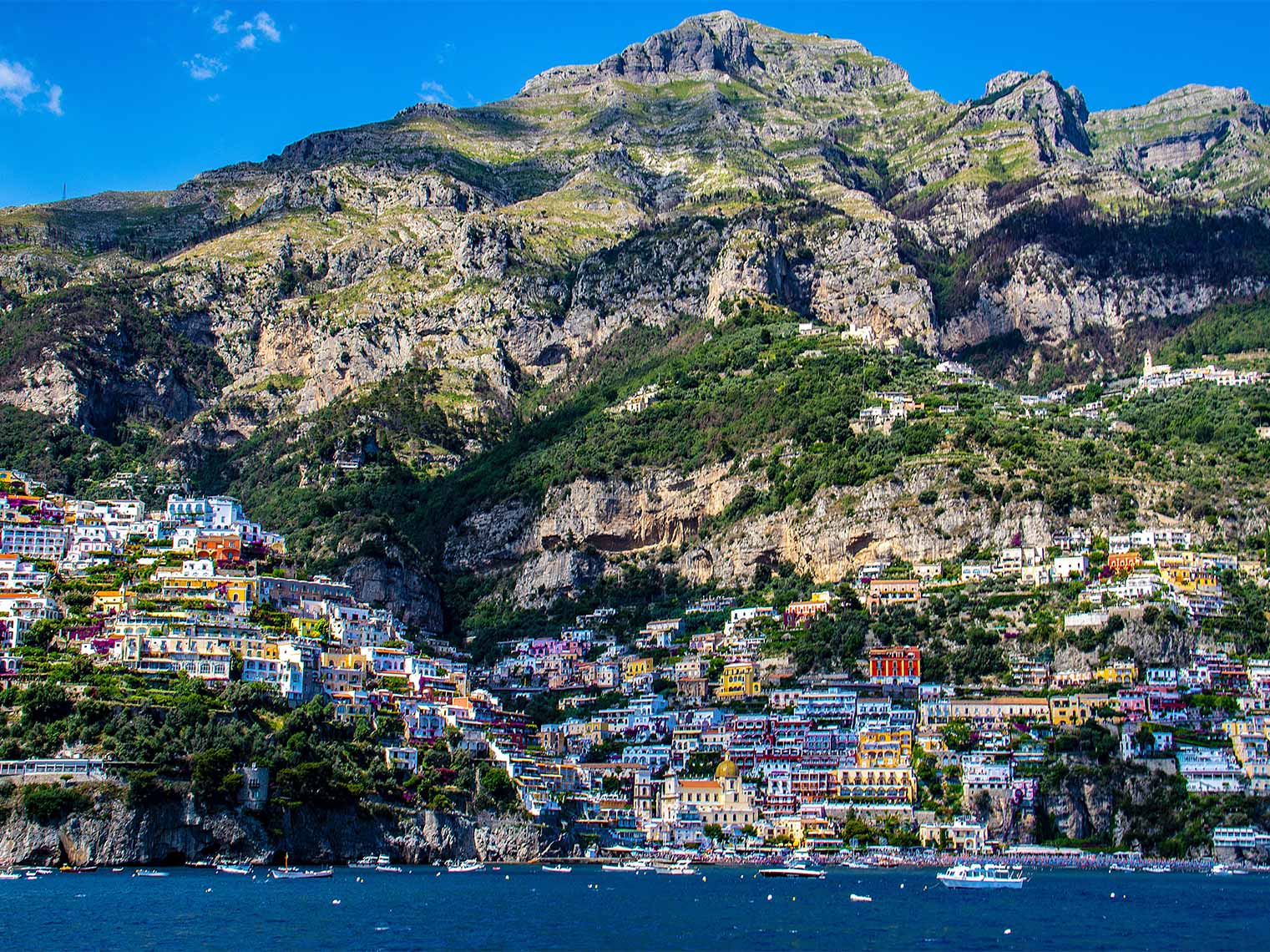 blue seas, colorful cliffside towns and your own private driver on the Amalfi Coast.