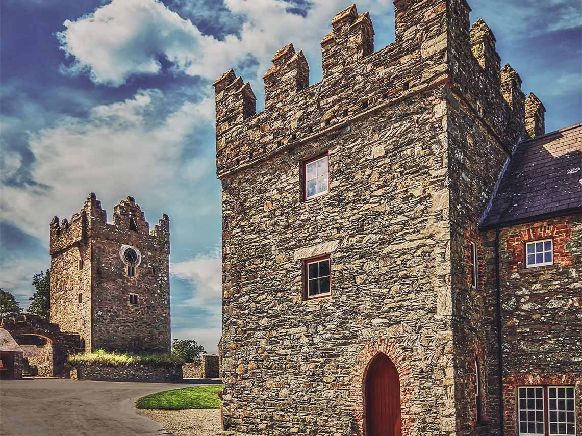 a tour guide showing clients around Castle ward in ireland.