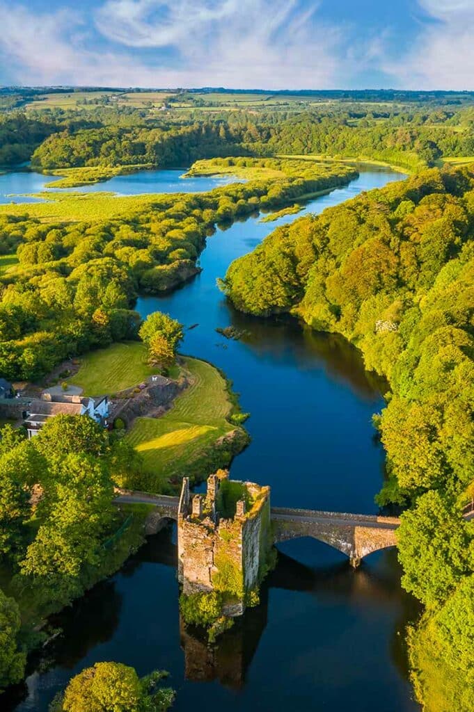 Carrigadrohid Cork Ireland old Irish touristic landmark meadow river sunset amazing aerial scenery view_