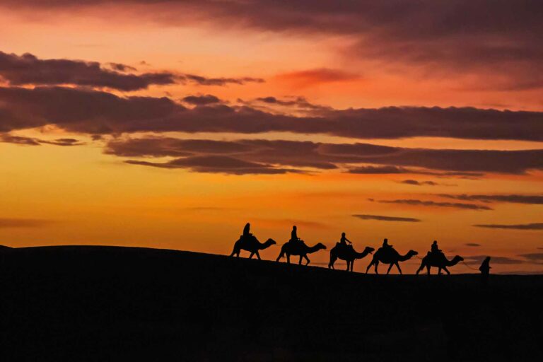 Morocco Merzouga Erg Chebbi sand dunes caravane sunset