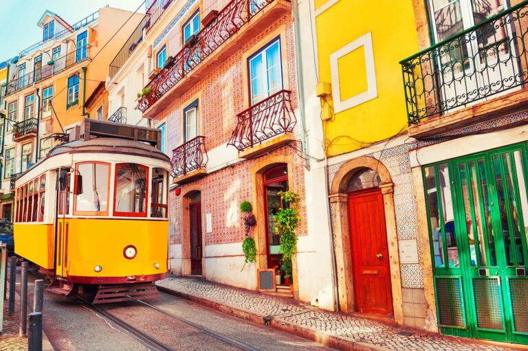 colorful tight Lisboa street with tram.