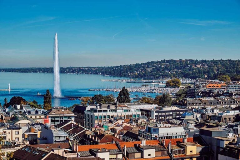 Geneva Day Trip featuring large water fountain.