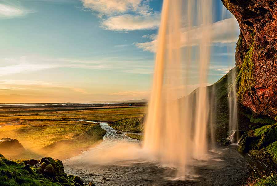 sunlight catching Seljalandsfoss Waterfall, Iceland