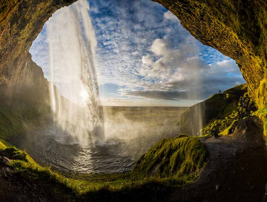 Seljalandsfoss Waterfall, Iceland viewed from inside looking out.