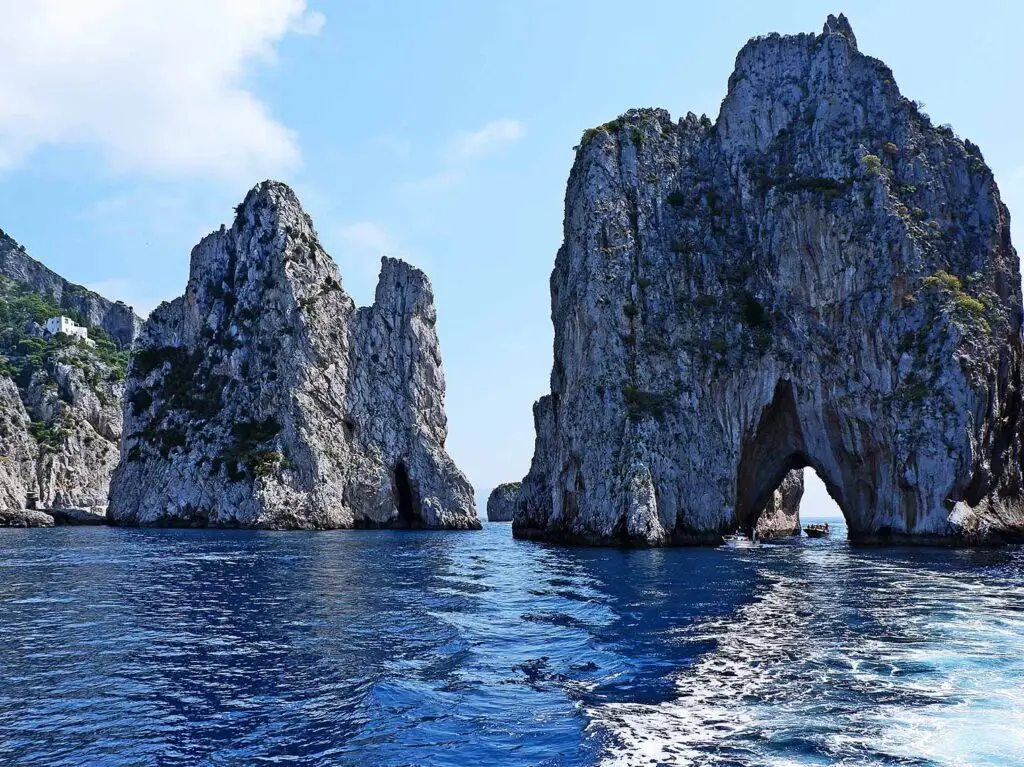 Scenic view of the iconic Faraglioni rocks on a private boat tour off the coast of Capri, Italy