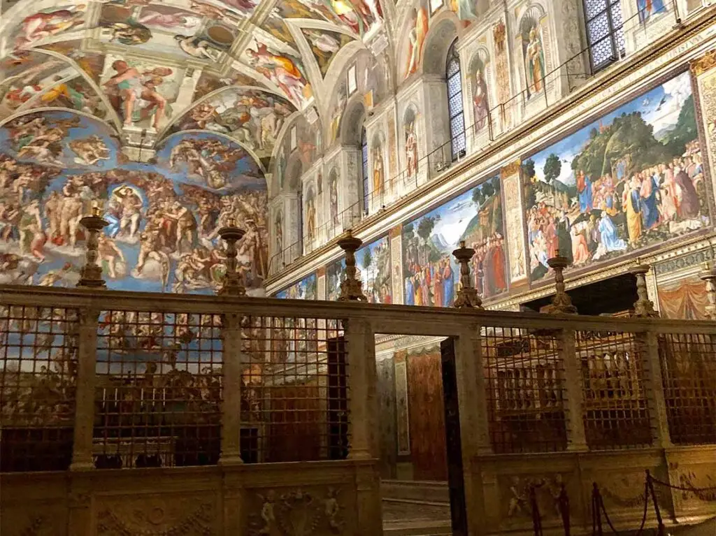Private VIP tour of the Vatican Museums showcasing the intricate frescoes and classical architecture of the Sistine Chapel after hours.