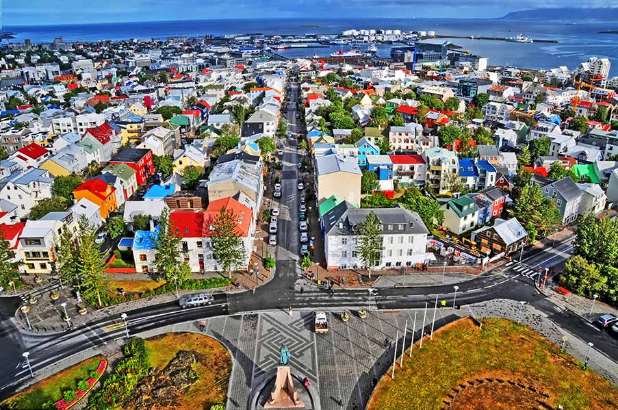 Aerial view of colorful buildings in Reykjavik, showcasing the vibrant architecture and scenic layout of the capital city of Iceland.